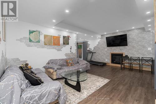 107 Allegra Drive, Wasaga Beach, ON - Indoor Photo Showing Living Room With Fireplace