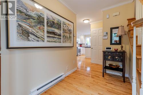 Hall leading to the office on the left and kitchen beyond - 131-139 Marine Drive, Logy Bay, Middle Cove, Outer Cove, NL - Indoor Photo Showing Other Room