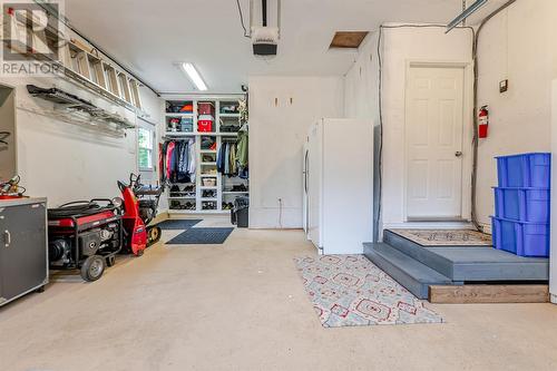 Garage with ton's of storage - 131-139 Marine Drive, Logy Bay, Middle Cove, Outer Cove, NL - Indoor Photo Showing Garage