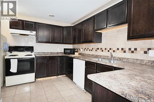 16 29Th Street E, Prince Albert, SK - Indoor Photo Showing Kitchen With Double Sink