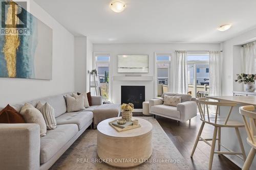 91 Chevron Place, Ottawa, ON - Indoor Photo Showing Living Room With Fireplace