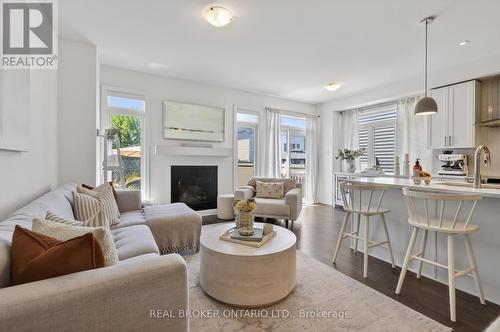 91 Chevron Place, Ottawa, ON - Indoor Photo Showing Living Room With Fireplace