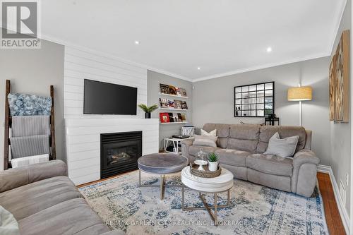 734 Brigadoon Drive, Hamilton (Gourley), ON - Indoor Photo Showing Living Room With Fireplace
