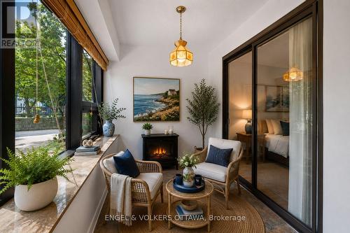 Virtually Staged - 104 - 2019 Carling Avenue, Ottawa, ON - Indoor With Fireplace