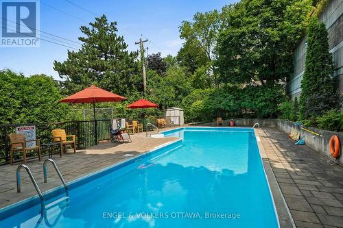 104 - 2019 Carling Avenue, Ottawa, ON - Outdoor With In Ground Pool With Backyard