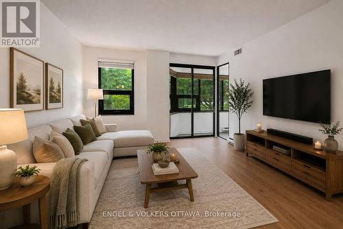Virtually Staged - 104 - 2019 Carling Avenue, Ottawa, ON - Indoor Photo Showing Living Room