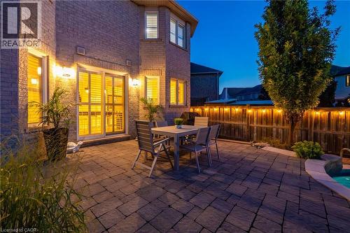 Expansive paver patio with a partial in-ground pool - 1533 Morse Place, Milton, ON - Outdoor With Deck Patio Veranda