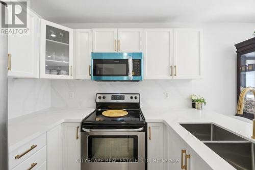 67 Buick Boulevard, Brampton, ON - Indoor Photo Showing Kitchen With Double Sink