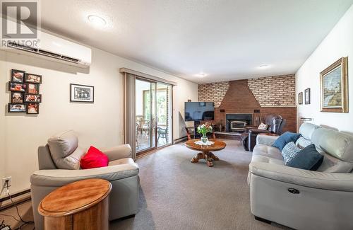 1435 Airport Rd, Prince Township, ON - Indoor Photo Showing Living Room With Fireplace