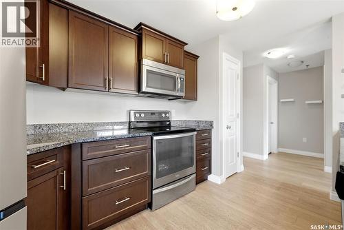 119 3630 Haughton Road E, Regina, SK - Indoor Photo Showing Kitchen