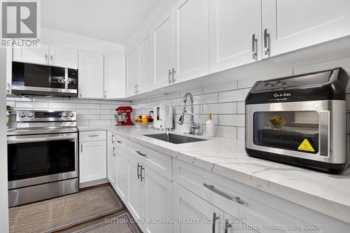 202 - 80 Grandravine Drive, Toronto, ON - Indoor Photo Showing Kitchen