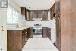 Quartz Countertop and Pantry In Kitchen - 