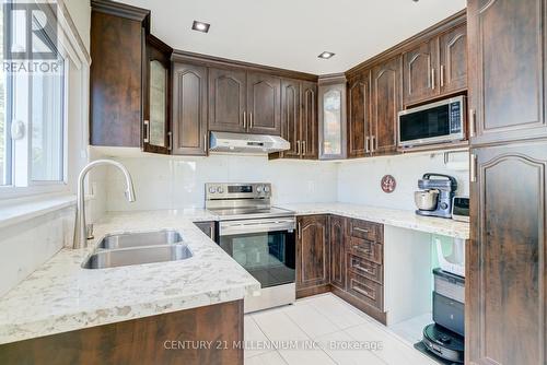 Stainless Steel Appliances - 75 Goldcrest Road, Brampton, ON - Indoor Photo Showing Kitchen With Double Sink