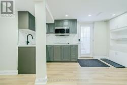 Kitchen In Bsmt. Apartment - 