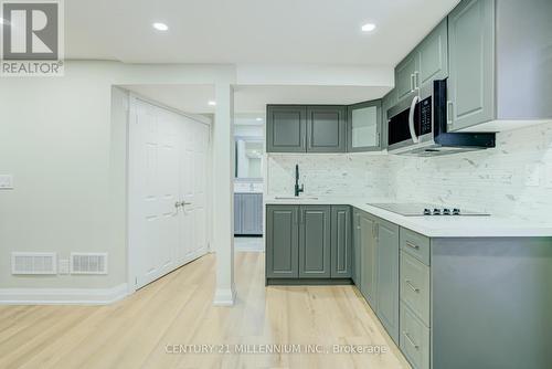Ample Kitchen Cabinets, Quartz Countertop - 75 Goldcrest Road, Brampton, ON - Indoor Photo Showing Kitchen