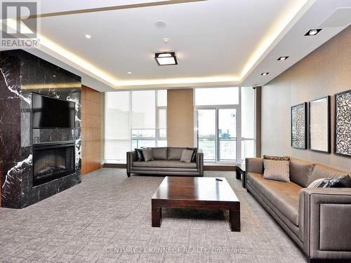 3910 - 4070 Confederation Parkway, Mississauga, ON - Indoor Photo Showing Living Room With Fireplace