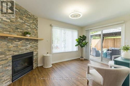 11 Algonquin Trail, Clarington (Bowmanville), ON - Indoor Photo Showing Living Room With Fireplace