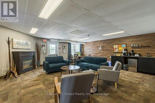 11 Algonquin Trail, Clarington (Bowmanville), ON - Indoor Photo Showing Living Room With Fireplace