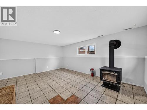 1255 Valley View Drive, Sparwood, BC - Indoor Photo Showing Other Room With Fireplace