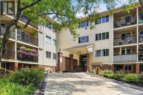 Welcome to 306-6470 Bilberry Dr - 306 - 6470 Bilberry Drive, Ottawa, ON - Outdoor With Balcony With Facade