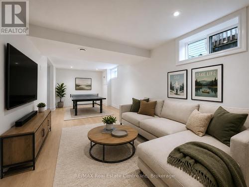 Photo has been virtually staged - 65 Stevenson Street N, Guelph (St. George'S), ON - Indoor Photo Showing Living Room