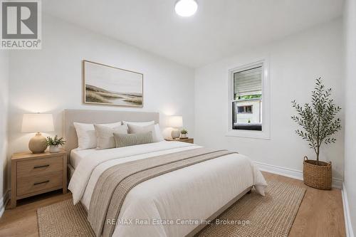 Photo has been virtually staged - 65 Stevenson Street N, Guelph (St. George'S), ON - Indoor Photo Showing Bedroom
