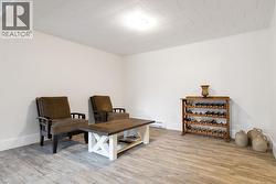 Flex space, addition to rec. room, or use as sitting area/ office space, lots of possible uses for this large area. - 