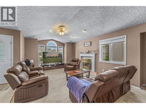 6857 Westgate Avenue, Prince George, BC - Indoor Photo Showing Living Room With Fireplace