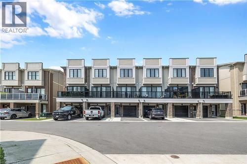 Contemporary multi-story townhomes featuring brick and siding exteriors - 1451 Green Road, Bowmanville, ON - Outdoor