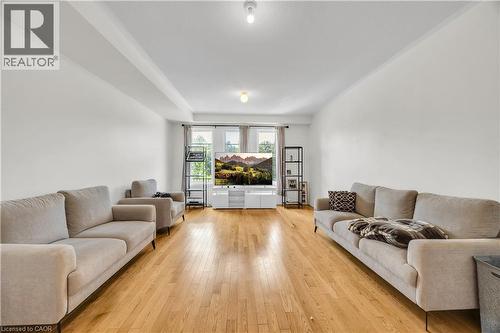 Spacious living area featuring light wood-finish flooring - 1451 Green Road, Bowmanville, ON - Indoor Photo Showing Living Room