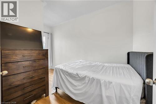 Hardwood-style flooring throughout - 1451 Green Road, Bowmanville, ON - Indoor Photo Showing Bedroom