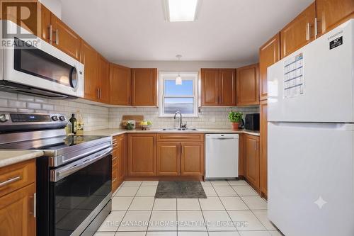 1373 Pharmacy Avenue, Toronto, ON - Indoor Photo Showing Kitchen With Double Sink