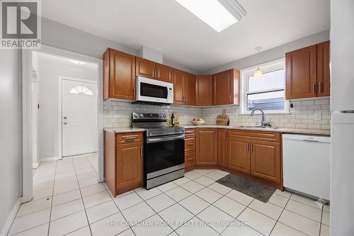 1373 Pharmacy Avenue, Toronto, ON - Indoor Photo Showing Kitchen With Double Sink