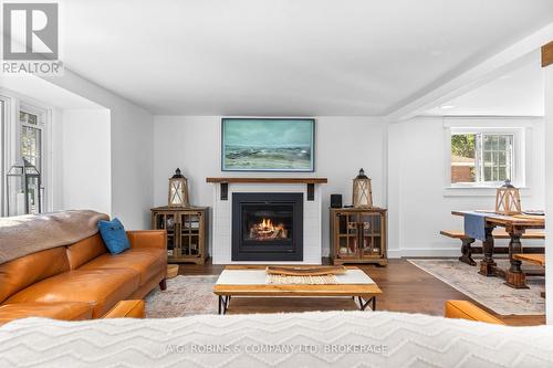 972 Silver Bay Road, Port Colborne (Sherkston), ON - Indoor Photo Showing Living Room With Fireplace