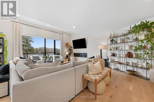 1060 River Road, Ottawa, ON - Indoor Photo Showing Living Room With Fireplace