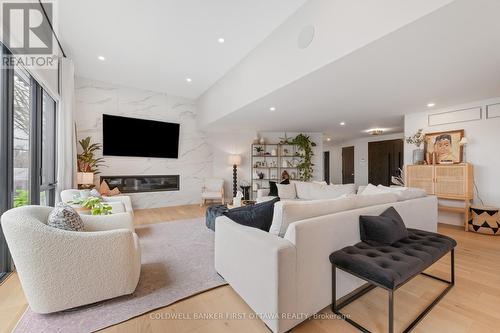 1060 River Road, Ottawa, ON - Indoor Photo Showing Living Room With Fireplace