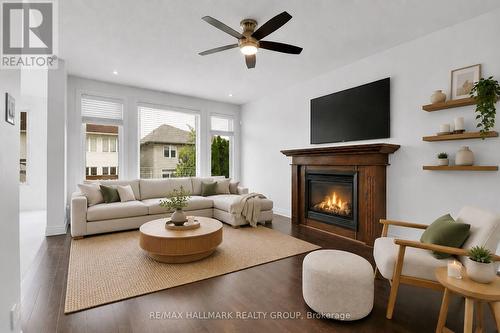 155 Whernside Terrace, Ottawa, ON - Indoor Photo Showing Living Room With Fireplace