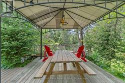 Covered Deck Overlooking Rapids - 
