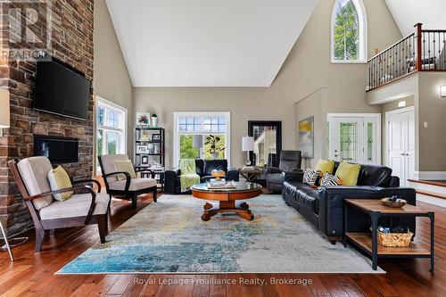 3889 Burnham Street N, Hamilton Township, ON - Indoor Photo Showing Living Room With Fireplace