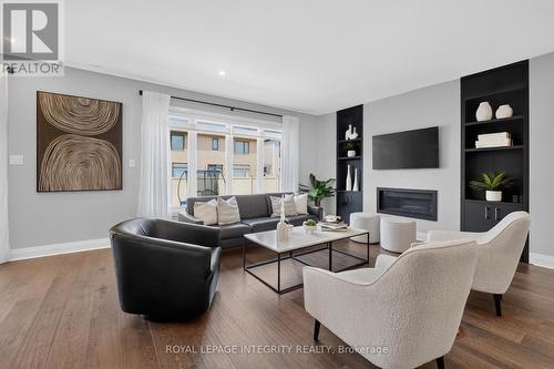 643 Gendarme Circle, Ottawa, ON - Indoor Photo Showing Living Room With Fireplace