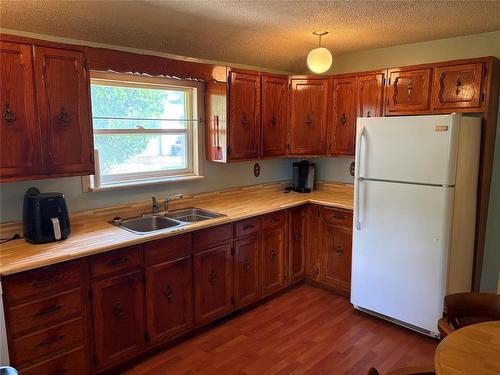 39 Sowden Street S, Souris, MB - Indoor Photo Showing Kitchen With Double Sink