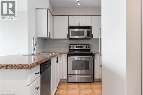 4889 Kimbermount Avenue Unit# 1707, Mississauga, ON - Indoor Photo Showing Kitchen