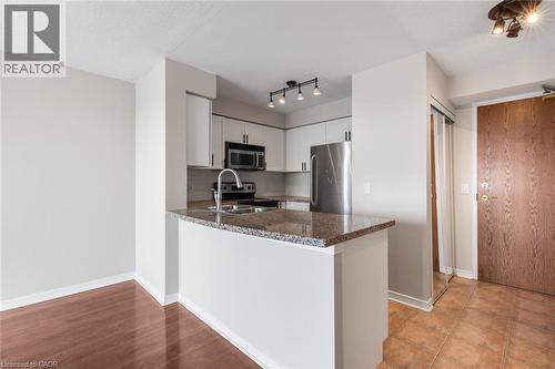 4889 Kimbermount Avenue Unit# 1707, Mississauga, ON - Indoor Photo Showing Kitchen With Double Sink
