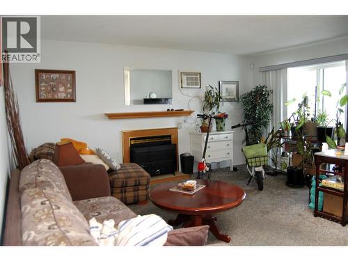 11110 Quinpool Road Unit# 2, Summerland, BC - Indoor Photo Showing Living Room With Fireplace