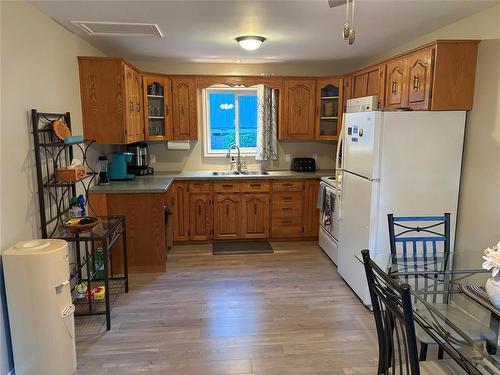 110 Spruce Street, Pelican Lake, MB - Indoor Photo Showing Kitchen With Double Sink