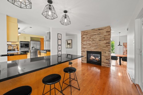 Kitchen - 121 Rue Des Épinettes, Morin-Heights, QC - Indoor With Fireplace
