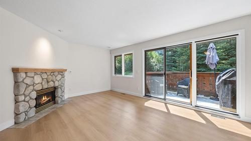 3-2160 Sun Peaks Road, Sun Peaks, BC - Indoor Photo Showing Living Room With Fireplace