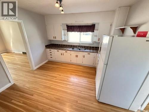 938 Iroquois Street W, Moose Jaw, SK - Indoor Photo Showing Kitchen With Double Sink