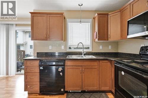 312 303 Slimmon Place, Saskatoon, SK - Indoor Photo Showing Kitchen With Double Sink