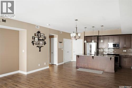 205 3702 Haughton Road, Regina, SK - Indoor Photo Showing Kitchen With Stainless Steel Kitchen With Upgraded Kitchen